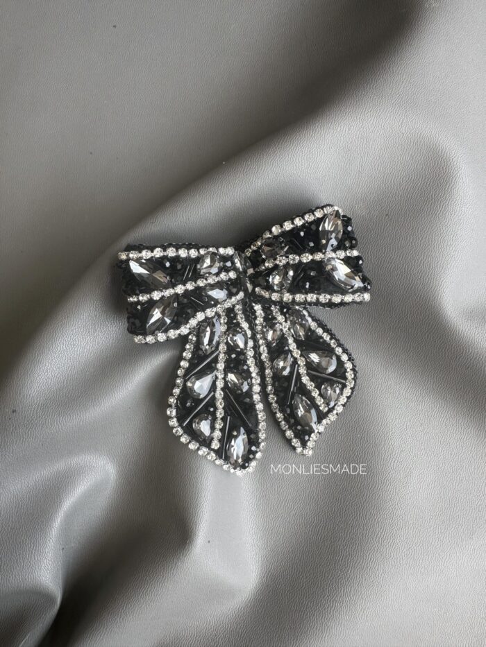 BC100726 – Diamond Bow Brooch – Black - Image 1