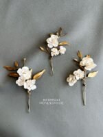 HC1005241 - Flowers White Haircomb With Leaf Bronze
