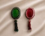 BC090326002- Scarlet Oval Brooch with Tassel
